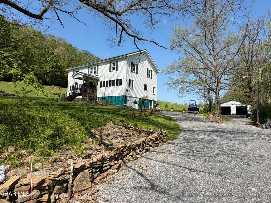 Look no further as your country paradise awaits! This massive 5 bedroom 2 bath farmhouse sitting on 14.5 beautiful acres will allow you to have animals if you like or simply enjoy hiking and hunting on your own property! If you love to fish a fully stocked stream is right across the street! The chicken coup, well house, barns, shooting range and large garage will give you plenty of options for hobbies.  The garage has a heated bonus room that will allow you to enjoy your hobbies all year long.  Let's talk about the house... this large home has plenty of family living space on the first floor starting with the spacious kitchen/dining area that can accommodate a large crowd.  The island is great for meal prep and will allow you to mingle with guests.  New windows brighten the living room that features a pellet stove for warming up on chilly nights.  The foyer has room for an office area and plenty of coat storage.  There is a first floor laundry room with storage for clothes and a 3/4 bathroom for guests complete this floor.  The second floor has 5 bedrooms, a space for everyone a full bath centrally located in the middle.  Call today for details on this expansive county retreat the perfect mix of indoor living and endless outdoor freedom.
