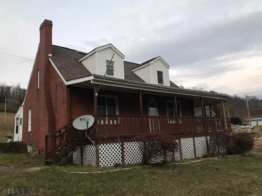 Nice 1 1/2 story brick home on 0.6 acre.  Modern oak kitchen & 2 moderns baths Spring water & coal heat. AS IS Sale. Right of way to property from Murphy Spring Rd.  Owner occupants only for 1st 20 days. Property must be listed in MLS a minimum of 7 days before any offer is negotiated or accepted.