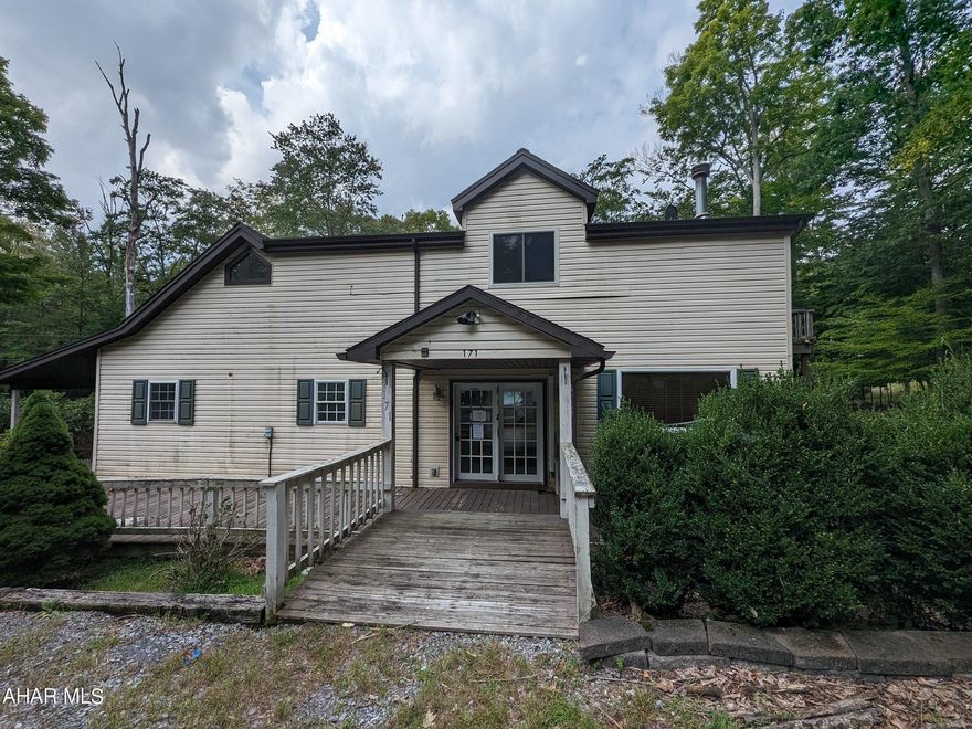 Glendale Yearound 2 vinyl story home on picturesque, treed lot with ample living space throughout.  Features spacious living room with stone FP, eat-in kitchen with large adjoining dining area. First floor bedroom, laundry area and bath. Upstairs features 2 bedrooms, master (Jack & Jill) bath and loft/office area. 2 car integral garage, large wrap-around deck and off-street parking. This property is part of an HOA - fees apply.  May qualify for seller financing (Vendee). Buyer pays both transfer taxes.