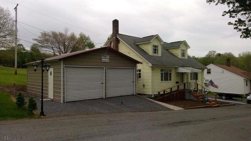 Step inside the door of this 4 bedroom 1 bath home, living room and dinning room have open concept 1st floor bonus room would make a great office this home has curb appeal Large basement that could be finished to make extra living space the convenience of a 3 car garage.  Great starter home waiting on a family to call it home.   3 lots total