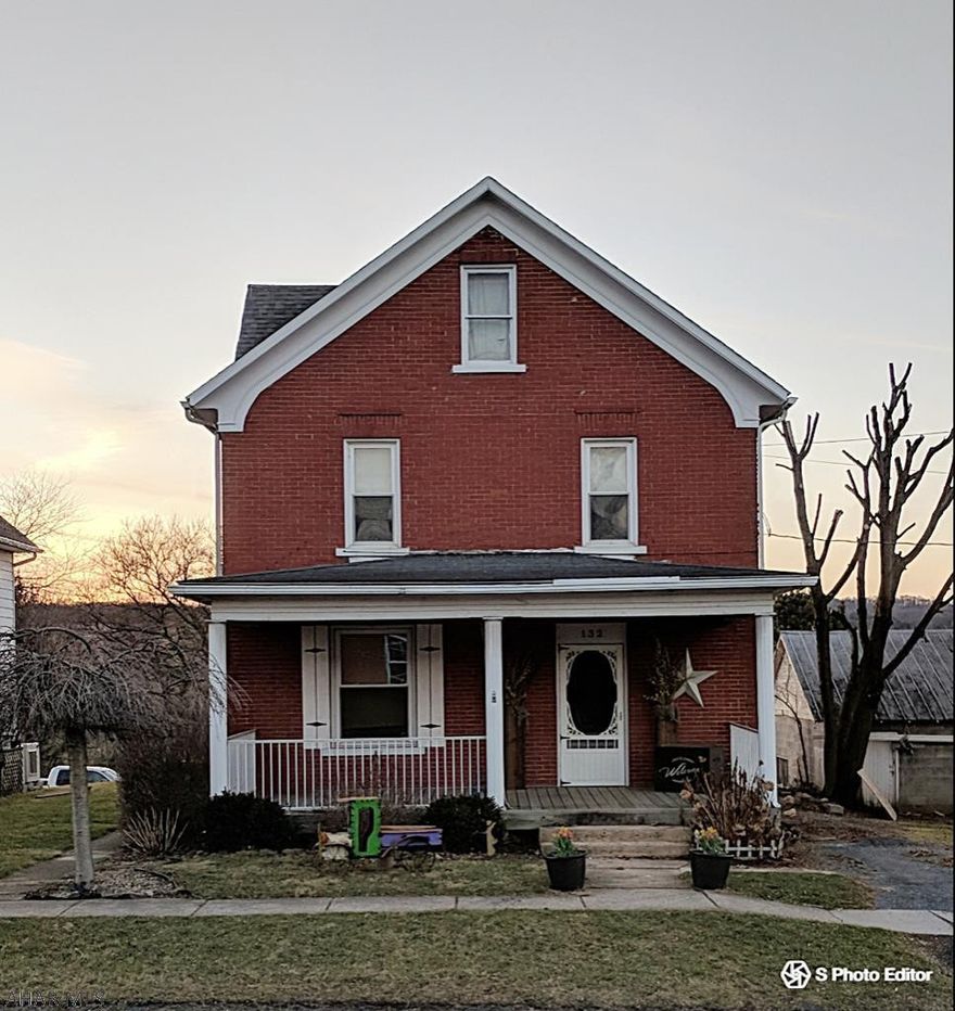 Craftsman style home with original woodwork , updated kitchen and bath, formal dining room, large kitchen, second floor balcony, super large deck  with a fantastic view of the lake and the open fields beyond.  A must see home