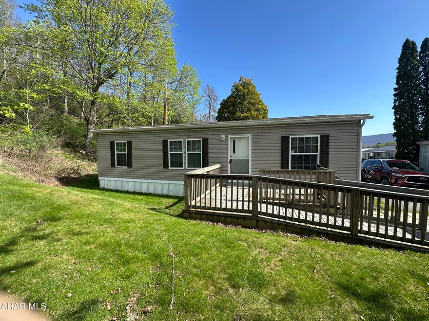 2014 Doublewide on a rented lot conveniently located in the Greenwood area of Altoona. 3 BR, 2 full baths. Paved parking area. Back deck is handicap accessible. Lot rent $340/month includes water/sewer & lawn maintenance. Applications to be submitted for lot approval.