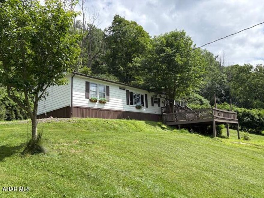 Nestled on a peaceful dead-end road, this spacious double-wide home offers a tranquil retreat while still being just minutes away from downtown. Enjoy the privacy of a generously-sized yard, perfect for outdoor activities or relaxation. The oversized garage provides ample space for storage, hobbies, or parking. A great combination of comfort and convenience! The listing agent is the owner.