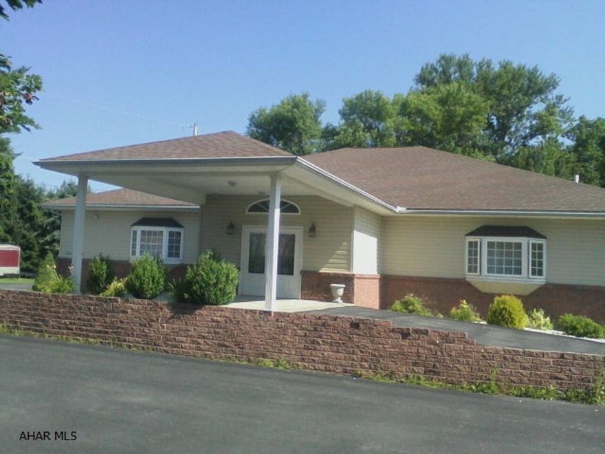 Beautiful newly built commercial 4200 sq. foot building with parking for over 30 cars complete with 2 car garage with apartment above. Will make great for medical center, doctors offices, dentists offices, church, or a daycare.