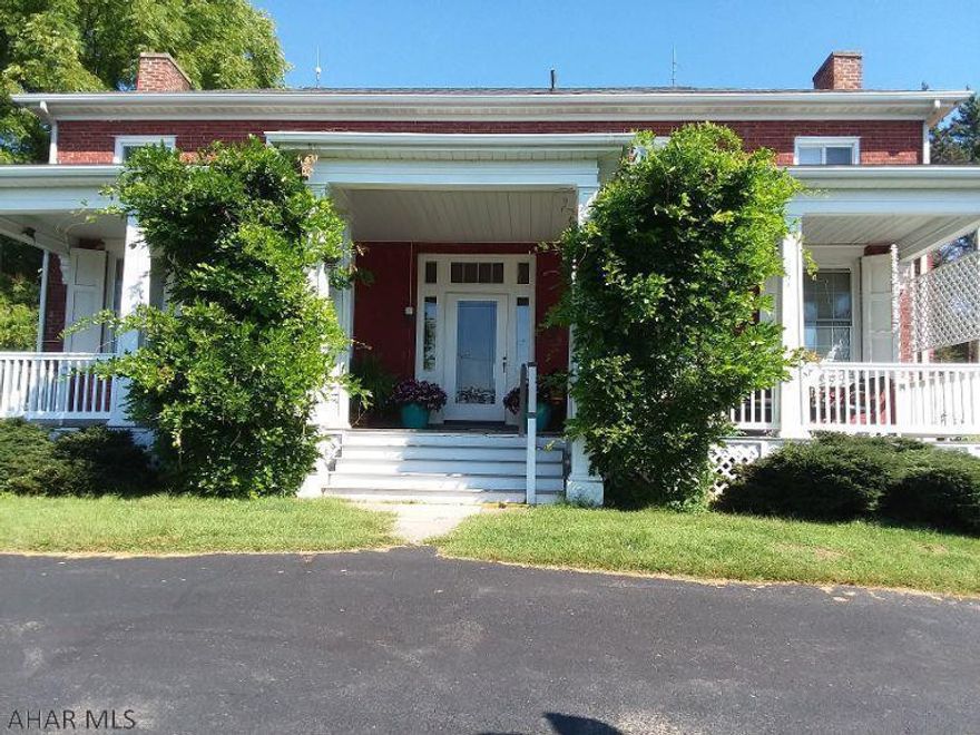 Newly renovated 1839 historic brick home centrally located between Bedford & Everett. Beautiful new kitchen. 3 BR (possible 5 bedrooms), 2 bath, 10 large rooms in total. 8 fireplaces, crown molding, and professional landscaping. New windows throughout. Township water and sewer with additional well, 200 amp service. New oil furnace. Summer kitchen, potting shed and large detached garage. Spacious plantation style front porch for relaxing. Beautiful residence with an excellent commercial location with large black topped parking lot and access at traffic light at Wal-Mart. Well maintained and a must see! Endless possibilities, priceless location.