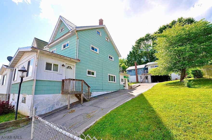 Wow! Awesome, well built 2 1/2 story home on double lot right next to Prospect Park in City of Altoona. Plumb, level, clean and ready to move in. 2 separate heating systems, hot water baseboard and forced hot air (with central cooling), both fired with natural gas. Lots of natural light from the many replaced windows! New metal roof, long paved driveway leading up to a 2 car garage with what had been a 2 bedroom apartment above it (1504 Bell Avenue); this can be restored, or you can use this space for anything you want ... shop, recording studio, art studio, whatever you like. Low tax bill, city gas fuel and a great price make this a very affordable home to make your own. See it today!