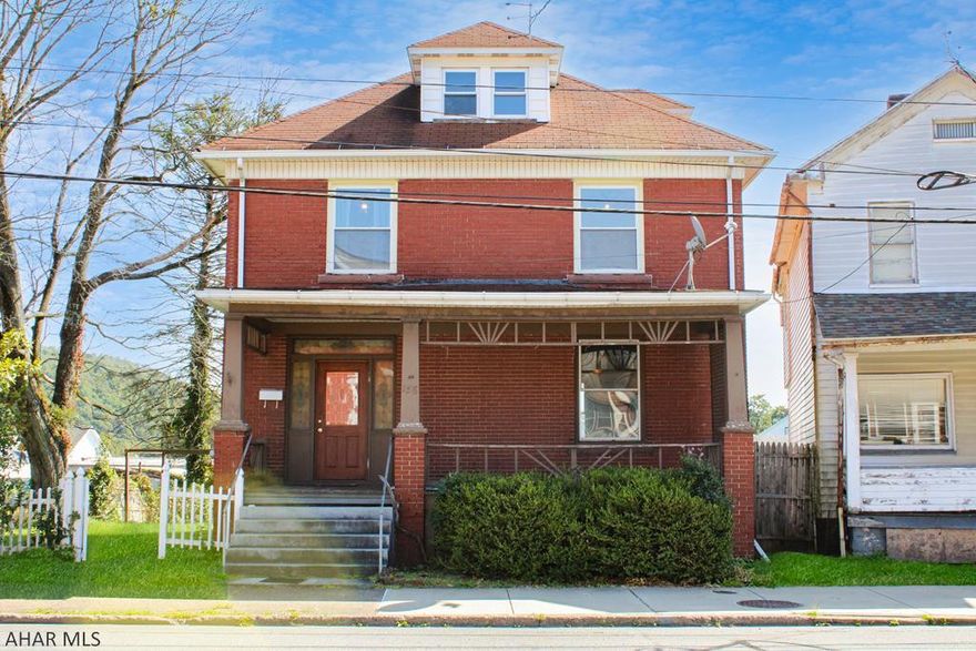 Built in 1916, this two and a half story home sits on 0.15 acres in the West End of Johnstown. As you enter the front door you will notice the one of a kind stained glass surrounding the doors frame. Upon entering you are welcomed by the gorgeous staircase and handcrafted woodworking. On the main level is your foyer, living area, formal dining room and an eat-in kitchen. On the second floor of the home are your 4 oversized bedrooms and 1 full bathroom. Continue up further to find the partially finished attic for storage, a bonus room or even a 5th bedroom! The basement is a large open space for storage and also has your second full bathroom. Out to the front and back of the home are covered porches to enjoy the beautiful weather. The large yard is fenced in and has a 2 car detached garage.