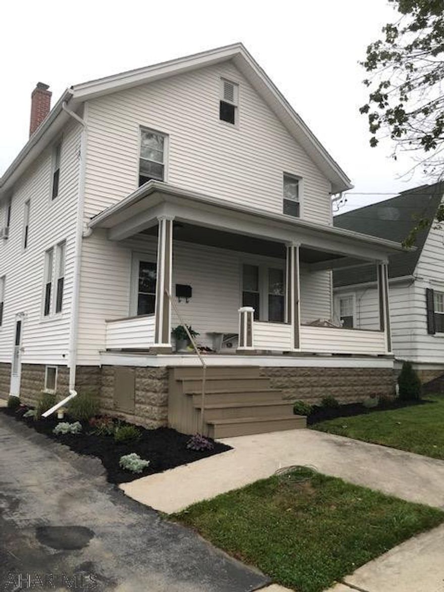Charming three BR home. Nicely updated kitchen and bathroom with beautiful woodwork throughout. Relax and three covered porches and a nice level fenced in backyard. Detached one car garage, off street parking and walking distance to schools and shopping. This won't last long!
