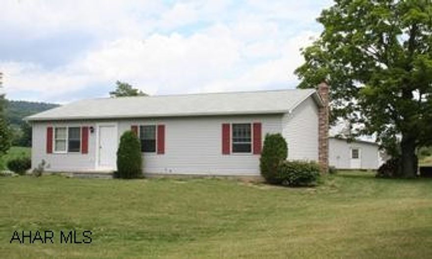 Vinyl Ranch house located in picturesque country setting. Vinyl Ranch house located in picturesque country setting. 3BR/1 full and 1 half baths, Eat-in kitchen, Living Room with wood burning fireplace. Full basement is partially finished. 32'x46' detached garage. Large yard.