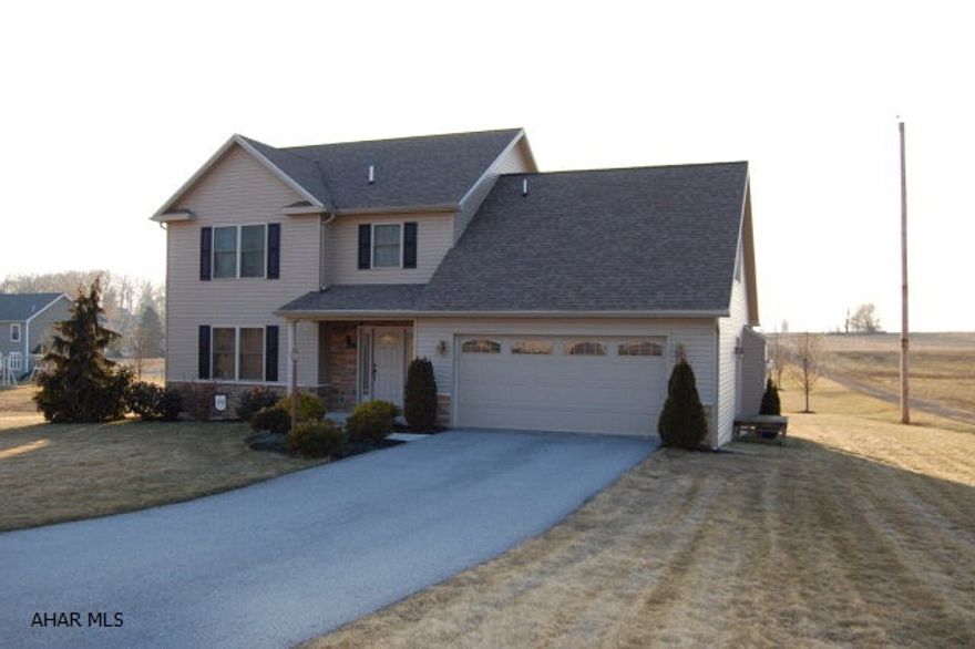 Must see!!  Immaculate 4 bedroom, 2 1/2 bath newer construction home in the Spring Cove School District.  Cherry hardwood floors throughout living and dining room area.  Crown molding with board and batten in dining room.  Open concept from kitchen leading into the family room features a lennox gas fireplace with beautiful Gettysburg mantel. Double glass doors lead from family room out onto a deck for entertaining.  Master bedroom with bath and walk-in closet.  Full open basement ready to be finished with plummed area for full bath.  Tons of storage space.  Don't wait, schedule fast.