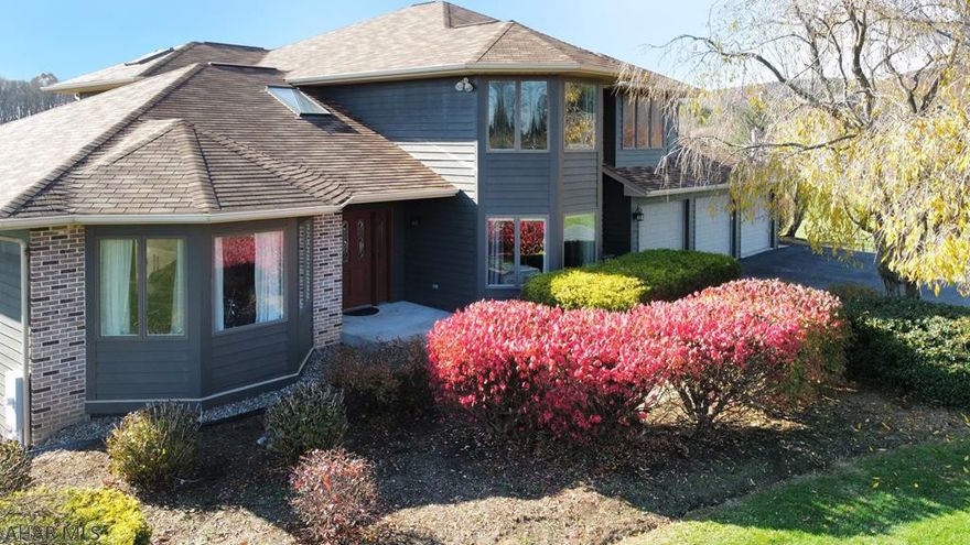 Captivating custom built contemporary perfectly positioned on 2 private acres in Graycairn subdivision.  This completely remodeled move-in ready home delivers a grand 2-story foyer, vaulted ceilings, an abundance of natural light & a free-flowing floor plan.  The 1st floor features Bamboo wood floors, eat-in kitchen with Granite countertops, tile backsplash & stainless appliances, remodeled full bath, sunroom, bedroom & laundry room.  Upstairs French doors lead you to the spacious owner's suite with a walk-in closet, doors to a private deck, full bath with large walk-in shower, jetted tub & dual vanity.  The finished walk-out lower level boasts a family room, den with wet bar, full bath & super cool Theatre room.  Less than 15 minutes from downtown State College/PSU & easy access to I99.