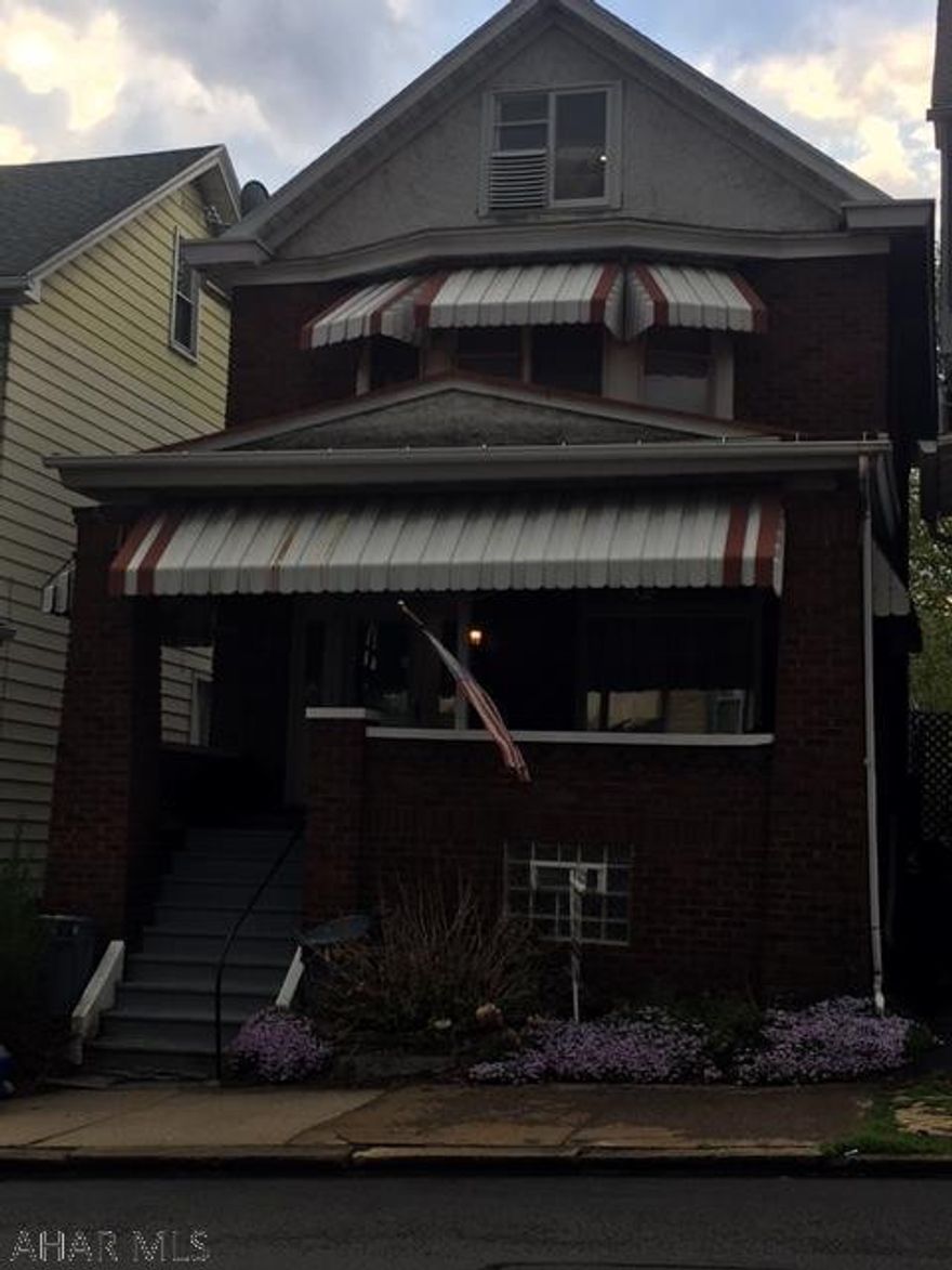 Brick home with off street parking.  Very nice home with an updated kitchen and bath. Nice first floor laundry room.  Spacious living room with beautiful woodwork.  Nice back yard with a deck.  Large master bedroom with nice size second and third bedrooms.