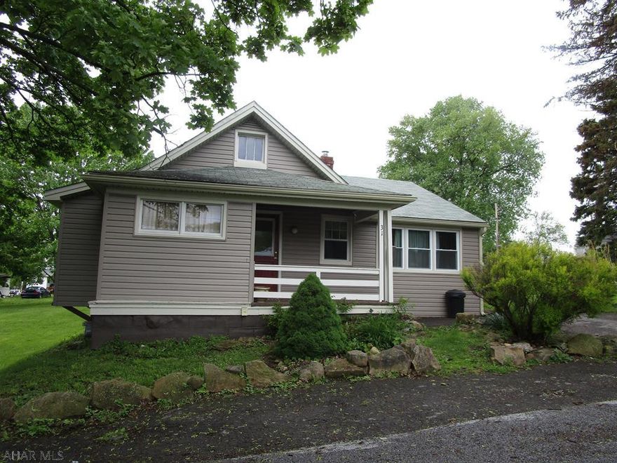 Cute 2-BR, one story home with 1 1/2 BA. 1 car detached garage and nicely fenced large lot! Check out the interior photos! New furnace and hot water heater.