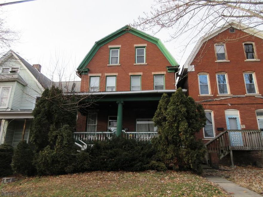 Altoona brick 2 story in need of TLC. AS-IS sale. Seller will make no repairs.