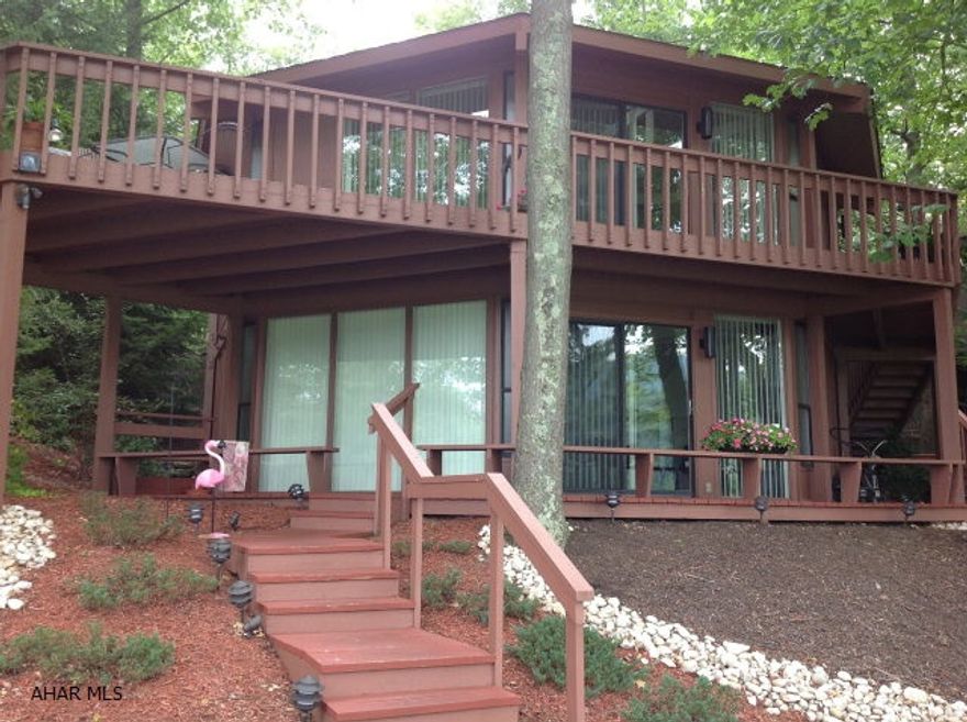 Weekend home, condo, or full-time Residence with a fabulous views of the mountains and Omni Resort Golf Course!!! Minutes from Historic down town Bedford. Custom built with 2 floors and spacious 2 car detached garage heated, water and 100 amp electric service.