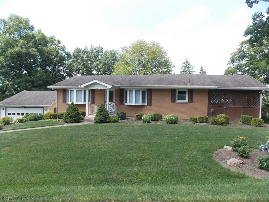 This adorable ranch home in Duncansville has 2 BRs and 1.5BAs.  The half bath which is in the basement could become a full bath very easily.  This brick home is very well maintained inside and out with updated kitchen, hardwood floors, new windows, large screened in porch, a huge finished basement and lovely landscaping.  The garage, at one point was in the basement but seller made the basement a very large FR and then built a separate 2 car garage.  This home is in a great location and is a perfect home to start out in or to downsize from the big house.  Call us today for a tour make an offer and move in before Thanksgiving!