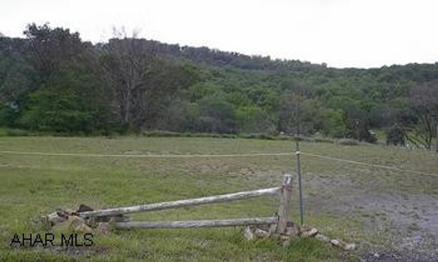 MODULAR HOMES & DOUBLE WIDES OK. GREAT VIEW. GREAT LEVEL LOT IN LOGAN TWP, .77 ACRE, SURVEYED, BORDERS BEVERLY HILLS & VERY CLOSE TO CAMPUS. CALL DARLA 696-1227 OR 934-4663. ALL PUBLIC UTILITIES AVAILABLE. MODULAR HOMES & DOUBLE WIDES OK. GREAT VIEW. GREAT LEVEL LOT IN LOGAN TWP, .77 ACRE, SURVEYED, BORDERS BEVERLY HILLS & VERY CLOSE TO CAMPUS. CALL DARLA 696-1227 OR 934-4663. ALL PUBLIC UTILITIES AVAILABLE.  FILL AT LEAST 5 YEARS OLD AND STABLE FOR BUILDING.  SURVEY ON FILE.