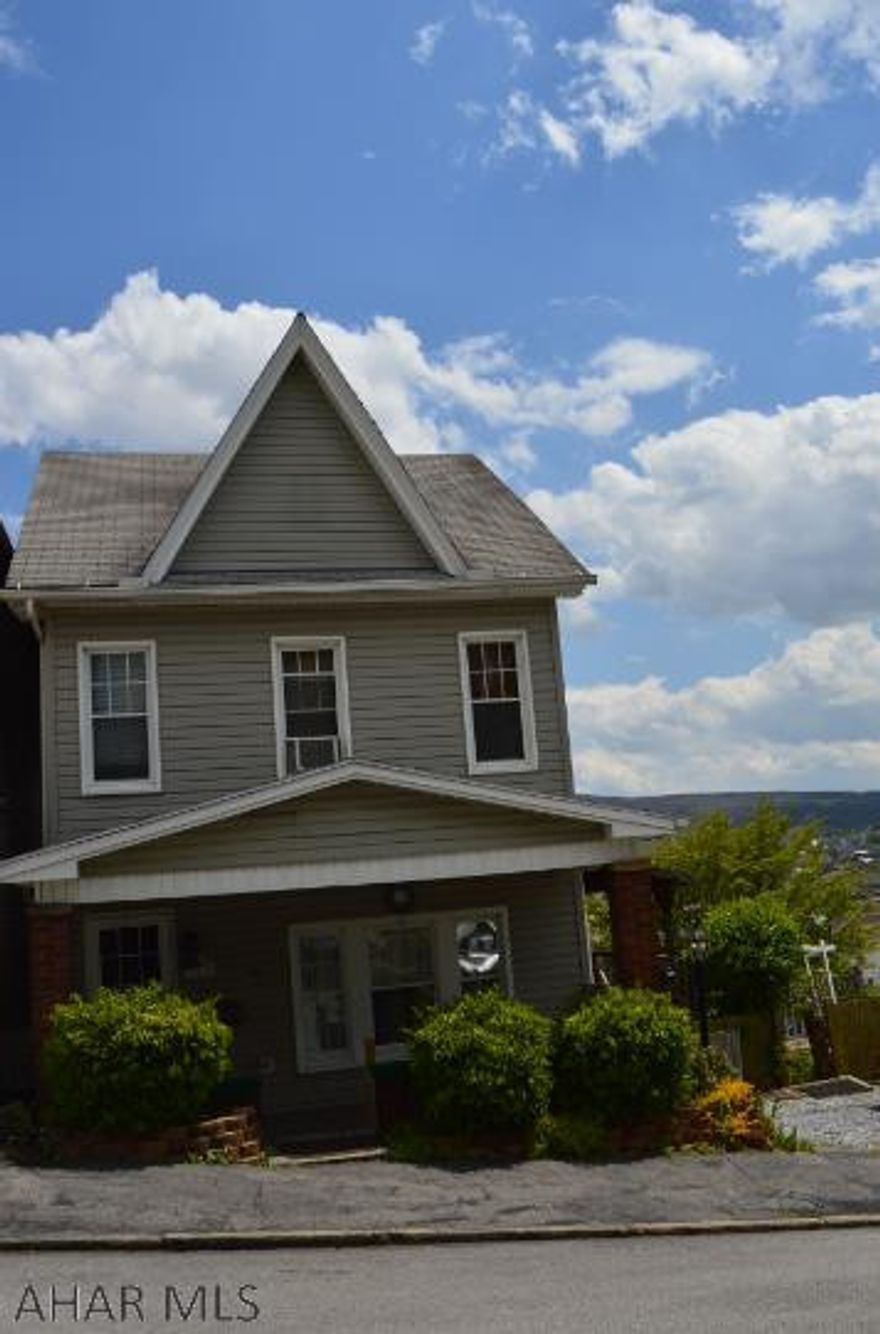 This solid home has been well-maintained and taken care of. It has 4 bedrooms & 2 full bathrooms. Newer boiler and hot water tank installed. Off-street parking and one car garage. The listing also includes an extra city lot. A charming wrap-around, covered deck overlooks abeautiful view.