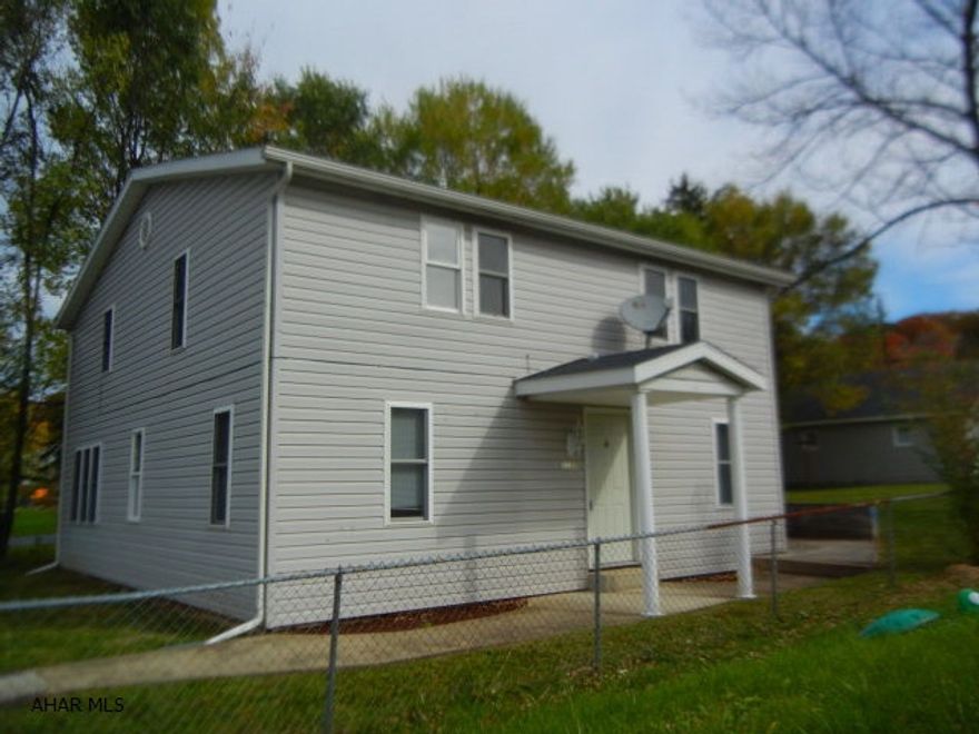 OPEN HOUSE SUNDAY, Jan 18th (11:30 --1:00)  Raise your family in this VERY spacious home located just off of old 6th Avenue Road  This home offers 4 Bedrooms, and room to grow.  Features a spacious eat in kitchen with attractive Granite counter tops, Pergo flooring and lots of counter space.  The living room is very spacious (19 x 10)  and there is a bonus room adjacent to that (could be office?!)  The 2nd level has 4 bedrooms, full bath and a walk in closet that measures 10 x 12 !!!   The laundry is conveniently located on the main floor along with 1/2 bath.  Have cookouts on the cement patio in rear of home.    2 car detached garage and additional off street parking for all your guests.  FLOOD INSURANCE NOT REQUIRED.