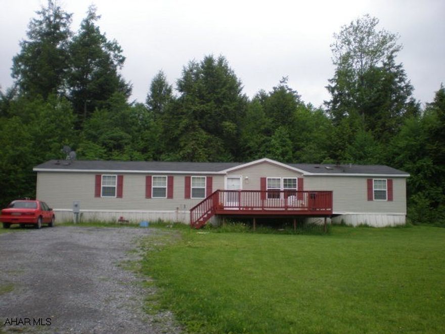 Nice doublewide on piers with 5.6 acres. Fireplace, cathedral ceilings. Great country location within a few minutes of Prince Gallitzin State Park.