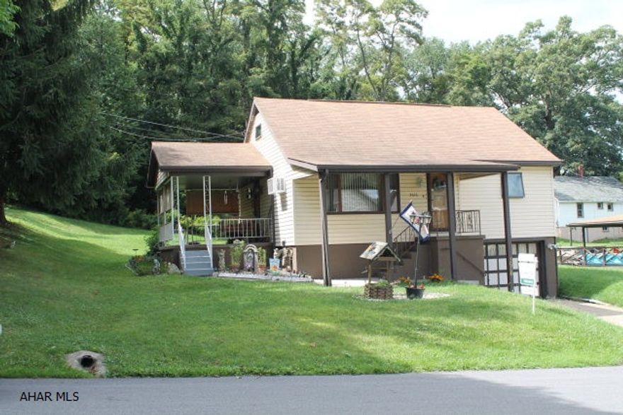 This charming cape cod style home has so much potential and offers 4 bedrooms and 2 full bathrooms. It sits on 4 city lots and is at the center of a beautiful neighborhood. The side covered porch makes a perfect place to grill, relax, and enjoy what the large yard has to offer. This home also has original wood floors throughout and has been maintained beautifully over the years. The basement has enough space and the ceiling height to be finished to add additional living space. With some newer updates to this house it would make the perfect home! *Seller is Very Motivated to sell*