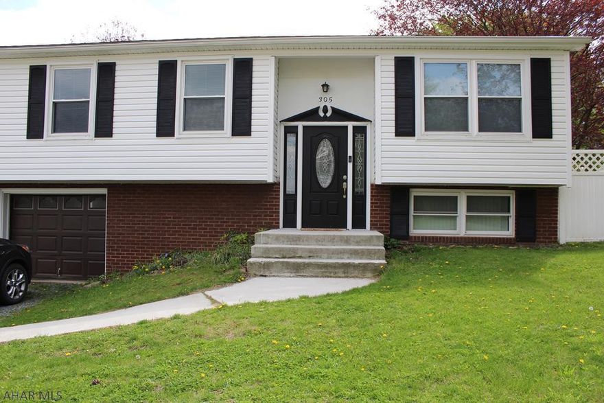 Maintenance free living on one floor! Open floor plan w/ glass back splash in modern kitchen with beautiful flooring. Updated bathroom with ceramic tile floors. Newer windows. Extra insulation to keep those energy costs low. Nice deck in the back vinyl fenced yard. 1 car garage . Quiet street in Spring Cove school district!