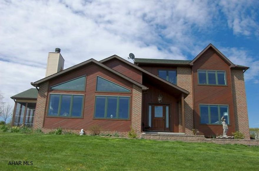 Exceptional 2-story home resting on 34.53 acres. This 3 Bed, 2.5 Bath home features a Great Room w/FP & Cath. ceiling, Kit w/granite counters & eat-in area, Formal Dining, Library/Den w/Franch doors & open Foyer. Large thermo pane windows throughout entire home with stunning mountain & country views. Full, partially finished bsmt, 2-car gar., side screen porch, Oil FA heat & central air. Gorgeous land w/pond, stream, meadows & vinyard. Country home yet close to all supporting amenities & major roads. Must See!