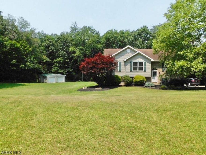 Your private oasis is here!  Fall in love with this gorgeous bi-level home with over 2600 square feet, situated on 1.48 acres in the Tyrone School district. Entertain with family and friends throughout your open concept main floor. The walkout back deck will top the party off, with views to die for. The lower level is newly finished to offer extra gathering space. With 4 bedrooms & 2 bathrooms, the home is perfect.  Don't forget the 2 car detached garage for all of your projects. Contact the Listing Agent today for your private tour.