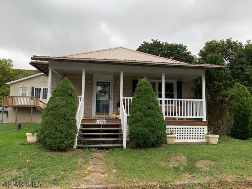 2 Bedroom house, plus 2 bedroom apartment with 2 car garage. Live in one and rent the other or rent both. Great rental history on both units. Plus two car garage. Separate utilities.  1098 Bedford St is also included with this property.