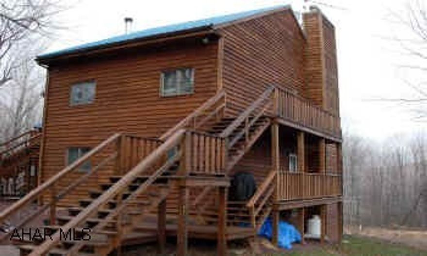 GORGEOUS BLUE KNOB CONDO WITH HUGE LOFT, BEAUTIFUL HARDWOOD AND TILE FLOORS. REMODELED BATHROOM, REBUILT ATRIUM. 3 MILES FROM SKI SLOPES! ASSOCIATION DUES $196 INCLUDES WATER/SEWER/TRASH/ EXT. MAINTENANCE/SNOW REMOVAL/OUTSIDE ELECTRIC.