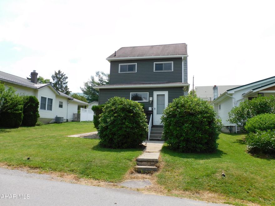 Perfect starter home in a desirable location! This great home is move in ready. Spacious living room and formal dinning room. New Paint and carpet throughout. Bonus room located on the first floor could be a small 3rd bedroom or office. Double lot and alley access for off- street parking. Keep cool this summer with Central AC. Don't wait on this affordable home!