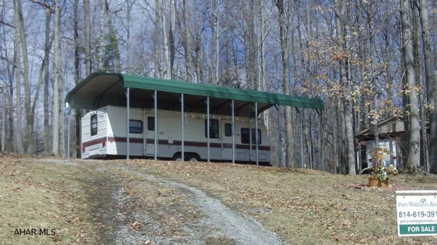 Semi-private campsite with metal pavilion included.  Great value, make it yours!