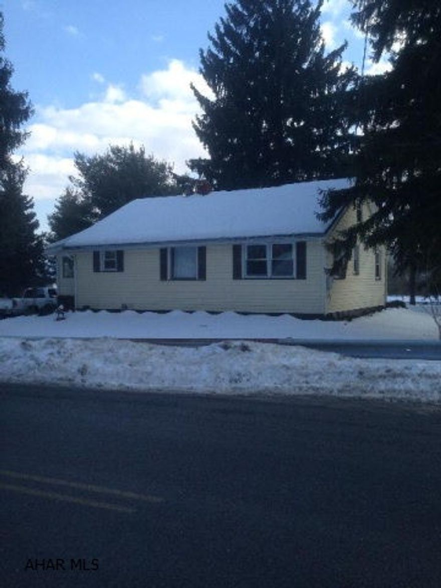 Eligible for USDA 100% financing!! Perfect ranch for down sizing or just starting out! Sits on a HUGE corner lot in a beautiful part of Eldorado. Easy to maintain, basement can easily be finished for additional living space, outside pavilion with bar-b-que for entertaining, 1.5 car garage, large deck, updated mechanics, and just cute as can be! Vacant-easy to show.