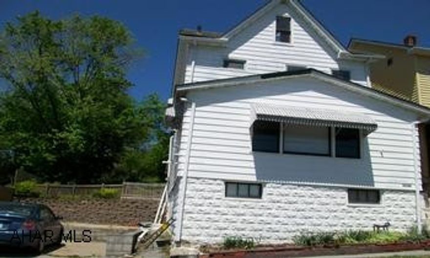 Property being sold in AS IS condition.  Purchase this property for as little as 3% down! This property is approved for HomePath Renovation Mortgage Financing. Please contact listing agent for more information.  Please contact listing office for required verbage on sales agreement. The adjoining lot is NOT included in the sale.