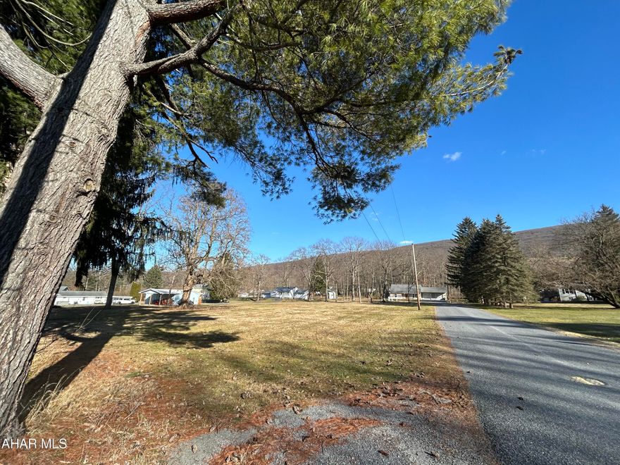 Spacious ~.88 acres flatland corner lot available for sale, Conveniently located with utilities available at the street.  Ideal for your dream home, garage or investment opportunity.  Explore the potential of this prime property!
Buyer to confirm taxes and lot size