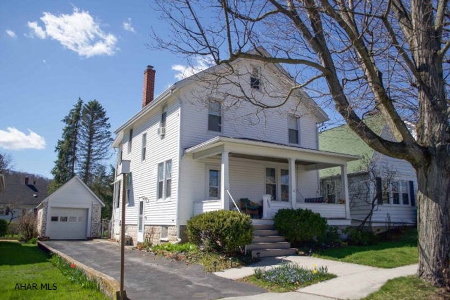 This well maintained home is nicely updated and move-in ready.  It offers a walk-in foyer, light & airy living room, dining room and kitchen on the first level.  Second level offers three bedrooms and a full bathroom with jet tub.  Relax on the large covered front porch or the second story covered porch overlooking the backyard.  The original natural wood work remains throughout this home, thermo pane replacement windows and oil hot water heat.  One-car detached garage, macadam driveway and fenced yard.  Just a short walk to the schools, downtown shoppes and restaurants and the new Heritage Trail. This comfortable home is ready for its new owner!!