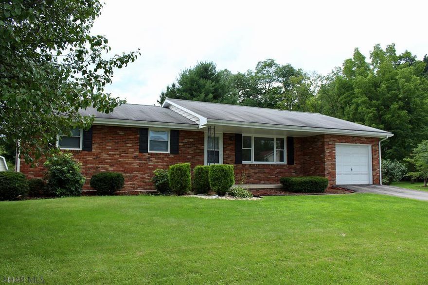 An updated ranch style brick home in Duncansville Borough.  This home features 3 large bedrooms and 2 full (updated) bathrooms.  The master bedroom has an en-suite full bath. There is new flooring throughout this great home.  The home has a full unfinished basement as well as a 1 car garage!  Covered rear porch which is a great spot to entertain or just relax.
