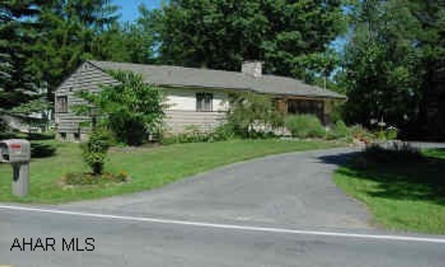 COZY RANCH HOME IN HOLLIDAYSBURG SCHOOL DISTRICT ON OVER 1/2 ACRE OF GROUND WITH CREEK AT EDGE.  PRICED TO SELL!  CENTRAL AIR AND FIREPLACE!  CONTACT MIKE MANGIA.