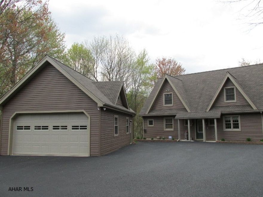 Custom built, 3 bedroom, 2 bath on 9.75 acres, secluded setting, radiant floor heat, new Trane heat pump, 2 car garage with additional 30 x 48 heated pole buliding, old farm house could be coverted to a livestock barn/stable. Minutes from downtown Hollidaysburg, home warrenty included, no drivebys, there is no sign on property.