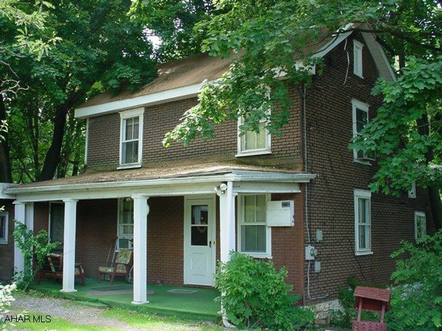 Drastically reduced!  Hollidaysburg area - Altoona S.D. Frame and insulbrick - 3 or 4 bedrooms.  Almost 1/2 acre, along Frankstown Road.  Attached carport.  Logan Township.  Good access to I-99. Main roofs are a year old. AS-IS SALE.