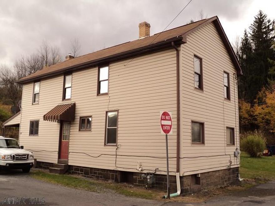 The interior has been repainted, new wood look laminate flooring was installed on the main and second floor including master bedroom the other bedrooms have new carpet.   Kitchen has vinyl flooring.  For storage of lawn and other items there is a room off the side porch./ See photos.  Newer furnace and water heater.  Included appliances are in as is condition. Taxes and lot measurements should be verified by buyer.  This property is priced to sell.  Why pay rent when you can own your own home.