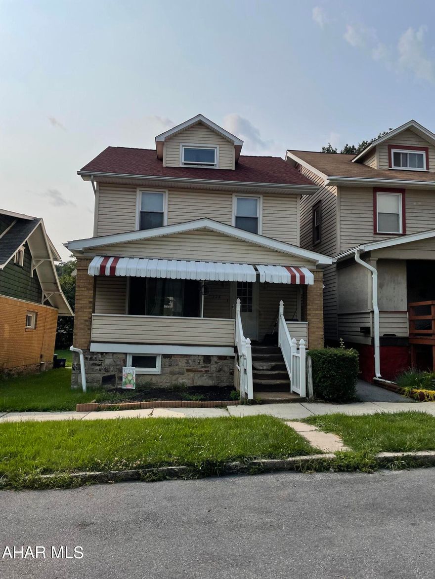 This property appraised and qualified for FHA financing, buyer just walked away!!! Their loss is your gain!!! Brand new carpet on the first floor!!!  This great starter offers a large living room for your family to spread out in, a dining room for holiday meals, a half bath for guests and the kitchen offers a unique layout to maximize storage and counter area for meal prep.   The second floor has three spacious bedrooms all with decent closet space for an older home and a large full bath.  The walk up attic is unfinished but has potential to be another bedroom, office or additional family living space.  The roof was replaced in 2018 right after current owners purchased, and radon was installed prior to purchasing home.  The seller is replacing the carpet on the first floor, it is ordered and will be installed as soon as it arrives. Call today to schedule a showing.