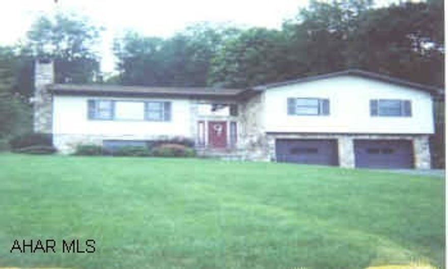 THIS HOME IS 1 MILE FROM BELLWOOD-ANTIS HIGH SCHOOL. EXCEPTIONALLY WELL BUILT HOME!  REAL STONE ON EXTERIOR, STONE FIREPLACE, 2 CAR GARAGE HAS EXTRA STORAGE AREA.  MAINTENANCE FREE EXTERIOR!  INCREDIBLE STONE PATIO IN REAR.  VERY PRIVATE.