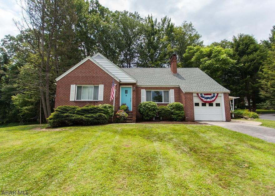 Location, Location, Location!!!   This is a beautiful home on a lovely piece of ground in the most ideal location with a five minute walk to a park.  A secluded side and back yard, with a large front yard.  Hard wood floors, freshly painted, remodeled full bathroom, huge basement with grande potential.  The second floor includes a study area, reading nook and french doors that open to the master bedroom that you can see the mountains from! This home is located in a quiet part of town.