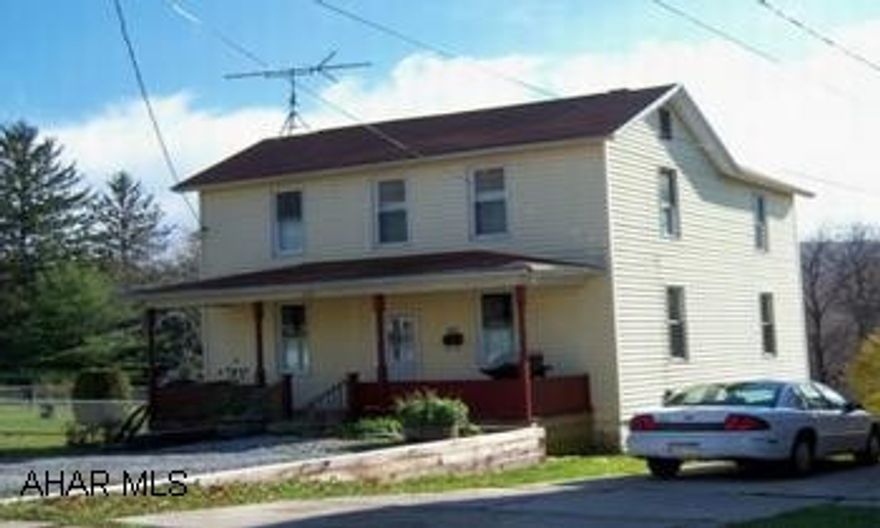 two story frame Great property. Newer windows, furnace and roof, 3-4 bedroom, kitchen, dining room, family room with rustic knotty pine walls, full width open front porch,, nice big back yard.