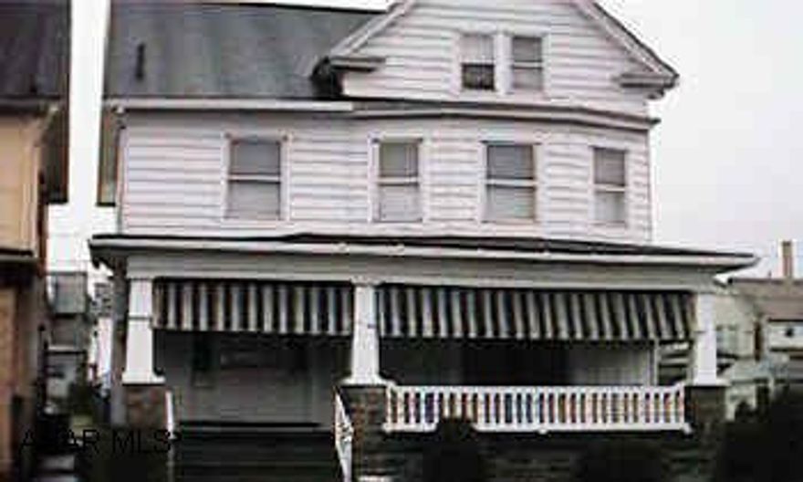 Large well maintained home on large corner lot.  Finished 3rd floor.  Could be duplexed or single family.  2nd floor covered porch.  2nd kitchen on 2nd floor.