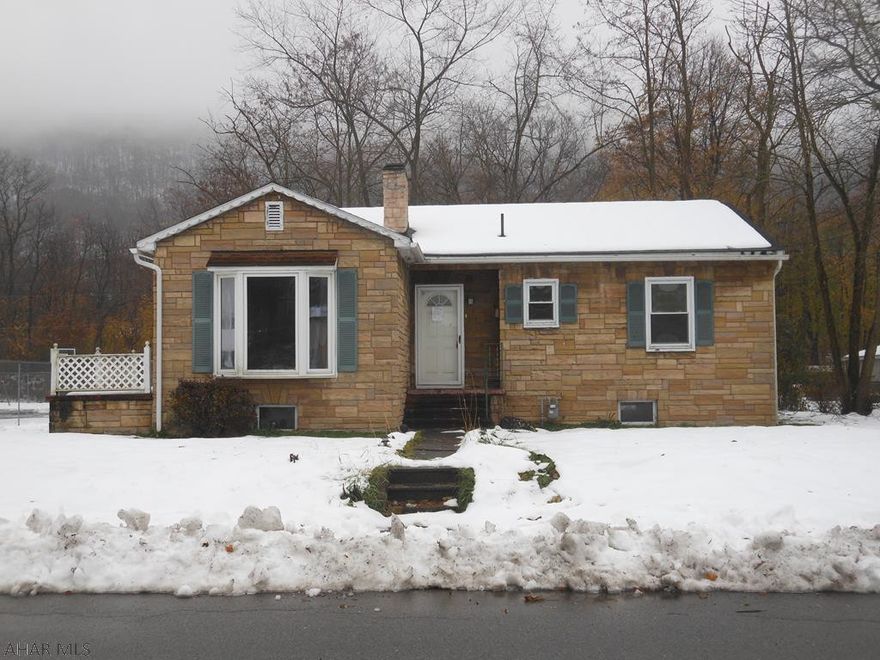 This is a Fannie Mae Homepath.com property. This is a one story home with stone facing in Tyrone. This property has a side porch for relaxing. The main floor features a living room with gas fireplace, eat in kitchen, family room with 1/4 bath, full bath and two bedrooms. The basement is unfinished. The property is located in a flood zone. With some updates, this house could be your home