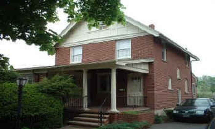 Well Maintained 2 story brick home with central air. Easy access on and off Penn St. with driveway to garage and alley in rear.