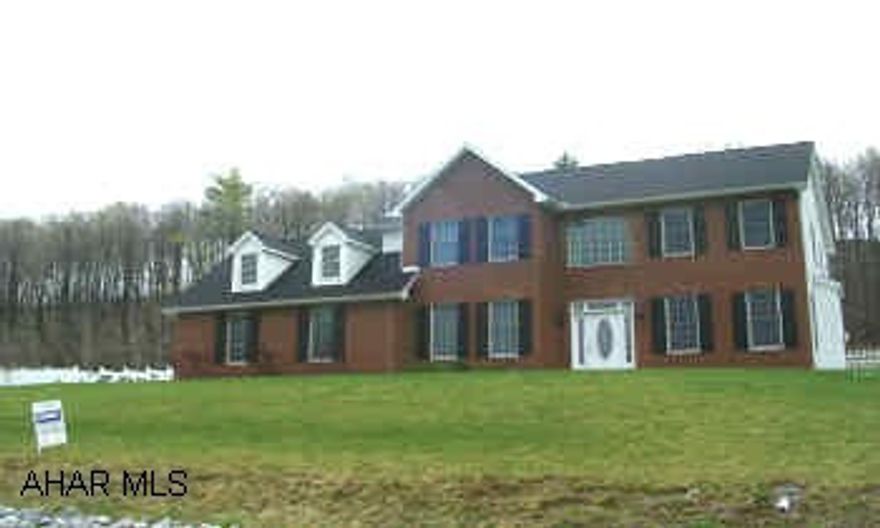 VIEW IS GORGEOUS. BACK BORDERS THE WOODS FOR LOADS OF PRIVACY. F.R. HAS A FP. BASEMENT IS FINISHED OFFERING LARGE FR W/RECESSED LIGHTING & WET BAR. LARGE BR, 1/2  BATH. STORAGE AREA. ATTIC COULD BE FINISHED FOR BEDROOM. WELL MAINTAINED.