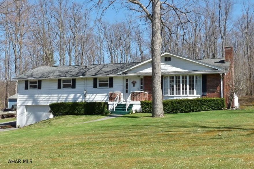 4 BR, 2 BA brick and aluminum ranch on a partially wooded 2+ acre setting close to Bedford County Sportsman Club. Features LR with wood burning FP, eat-in kitchen, hardwood and tile flooring, full unfinished basement with laundry hook-up, wood burner and separate integral garage. Deck and large back yard and for outdoor activities includes fenced garden and 14 x 24 shed.